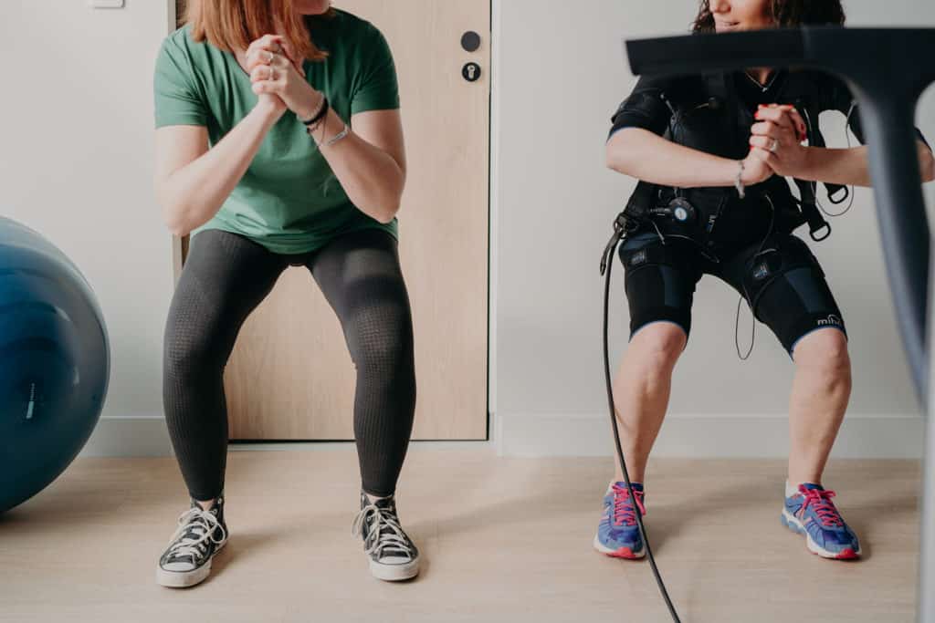 Séance d'électrostimulation avec une coach